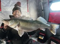 Walleye thru huge crack, Decked-out ice rigs, Best custom rod on the planet